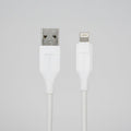 A white USB-A to Lightning cable shown against a black background, with both connector ends visible and the cable extending downward.